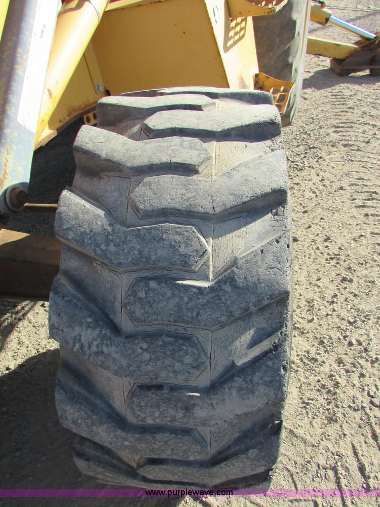 image for item I6737 1998 New Holland 655E backhoe