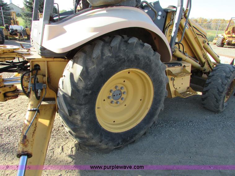 image for item I6737 1998 New Holland 655E backhoe