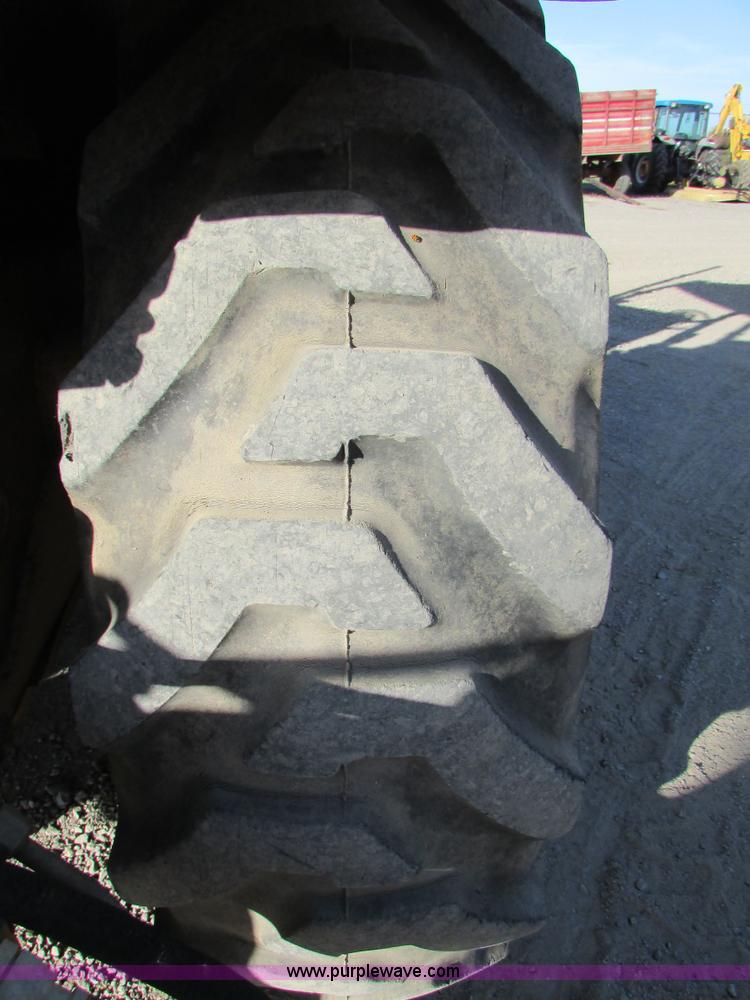 image for item I6737 1998 New Holland 655E backhoe