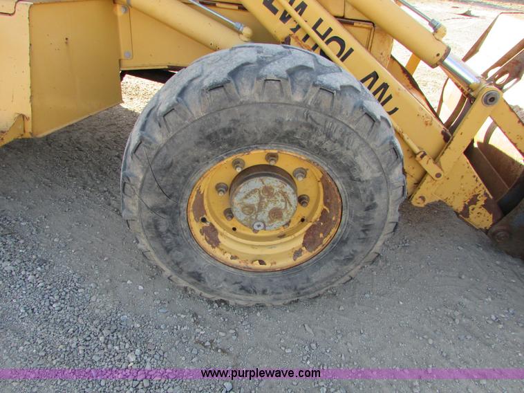 image for item I6737 1998 New Holland 655E backhoe