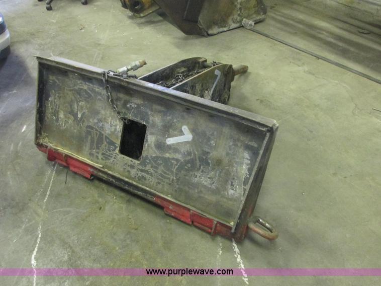 Skid steer breaker attachment in Tulsa, OK Item J2386 sold Purple Wave