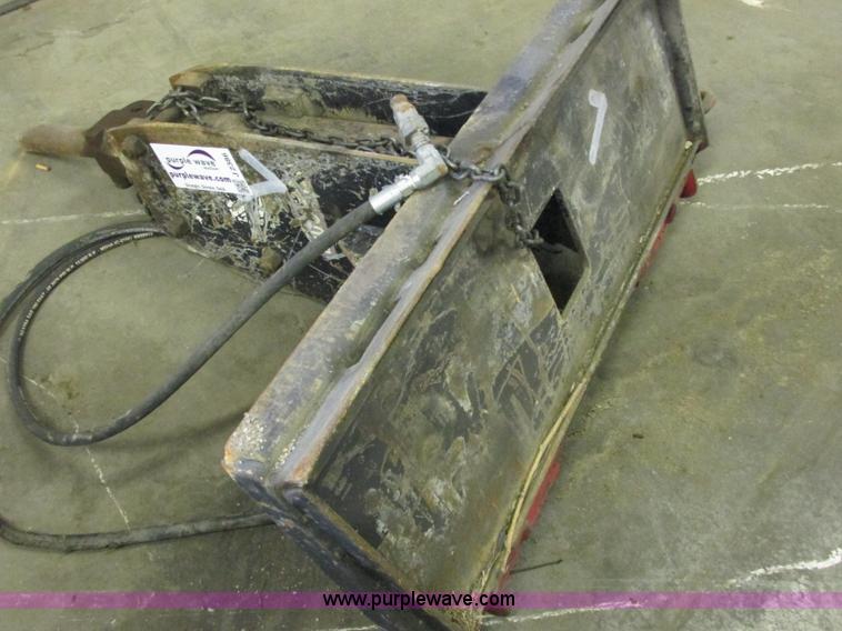 Skid steer breaker attachment in Tulsa, OK Item J2386 sold Purple Wave
