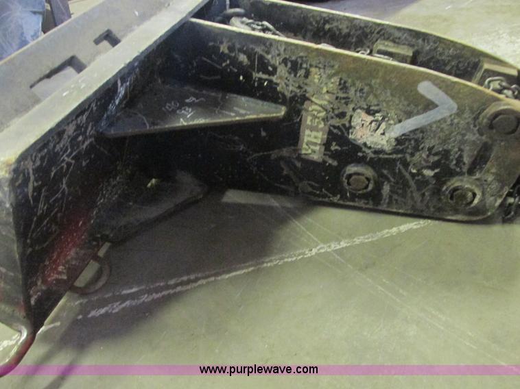 Skid steer breaker attachment in Tulsa, OK Item J2386 sold Purple Wave