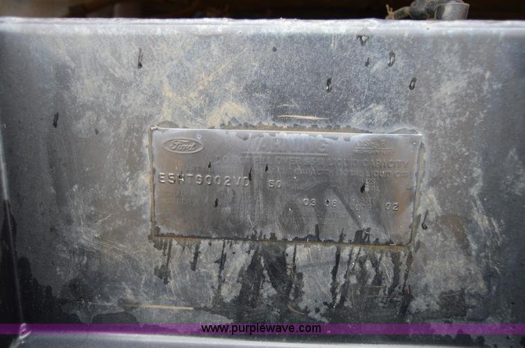 image for item Z9069 1988 Ford F700 flatbed truck