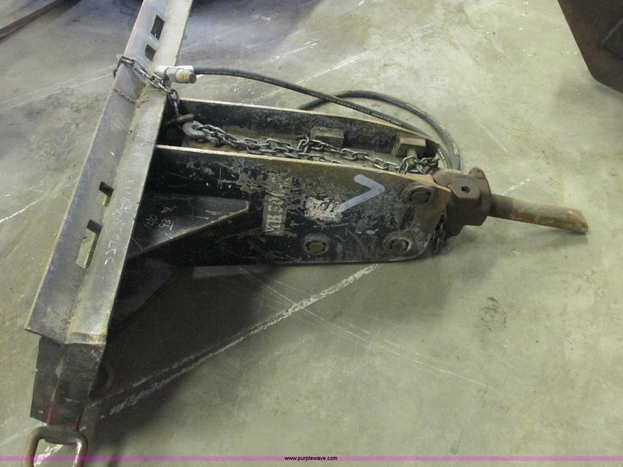 Skid steer breaker attachment in Tulsa, OK Item J2386 sold Purple Wave