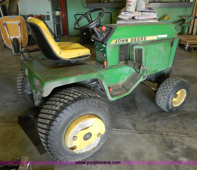 image for item AQ9405 John Deere 420 lawn mower
