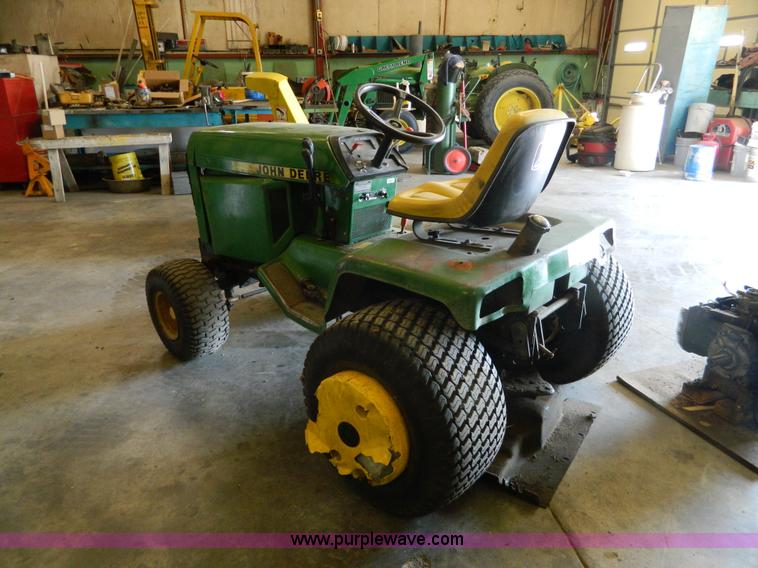 image for item AQ9405 John Deere 420 lawn mower