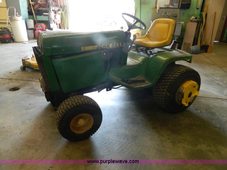image for item AQ9405 John Deere 420 lawn mower