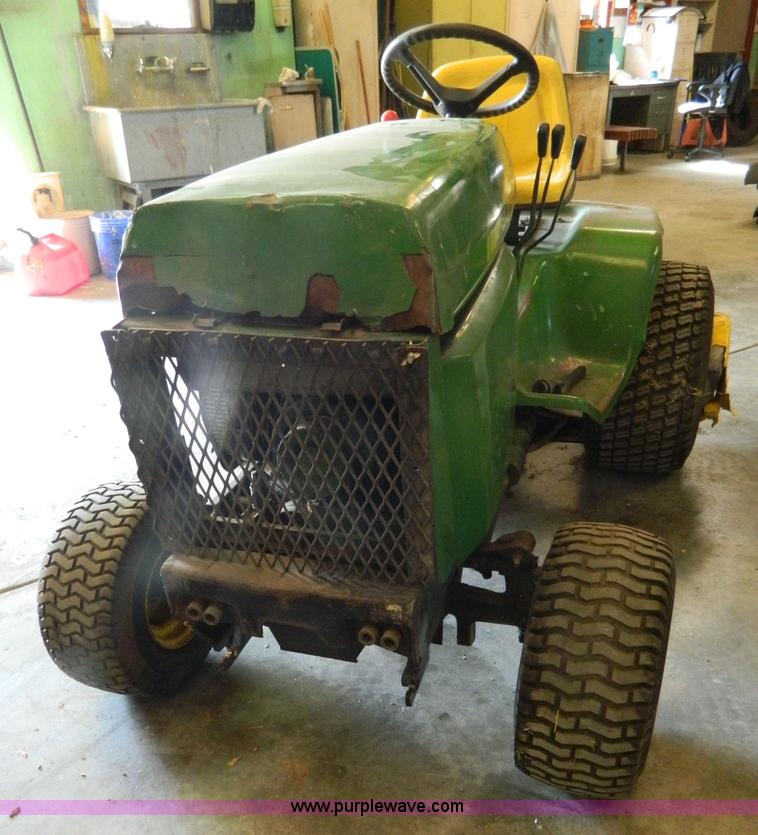 image for item AQ9405 John Deere 420 lawn mower