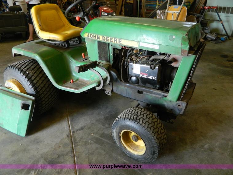 image for item AQ9405 John Deere 420 lawn mower