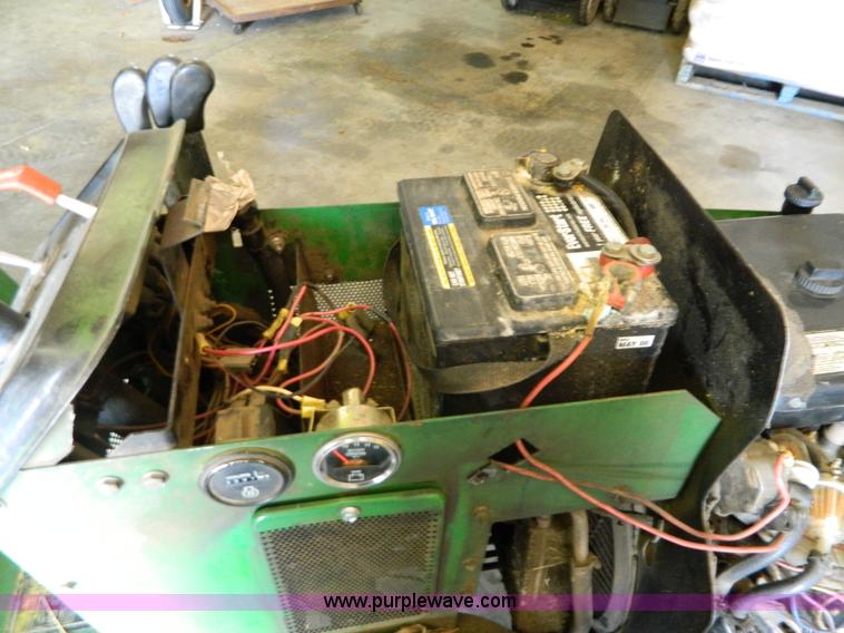 image for item AQ9405 John Deere 420 lawn mower