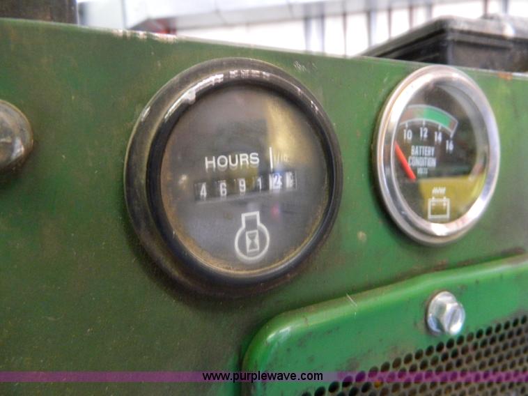 image for item AQ9405 John Deere 420 lawn mower