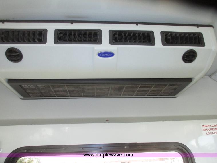 image for item G9911 2008 Ford E450 Super Duty Goeshen coach bus