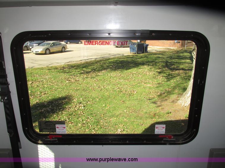 image for item G9911 2008 Ford E450 Super Duty Goeshen coach bus