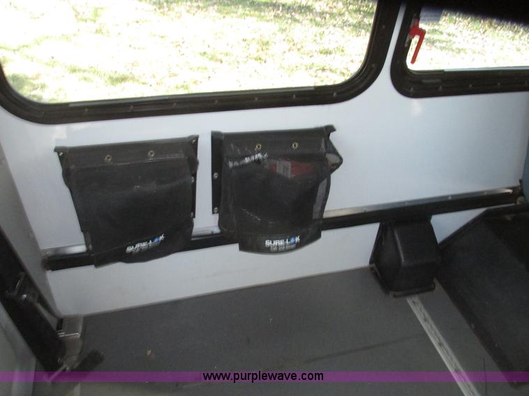 image for item G9911 2008 Ford E450 Super Duty Goeshen coach bus