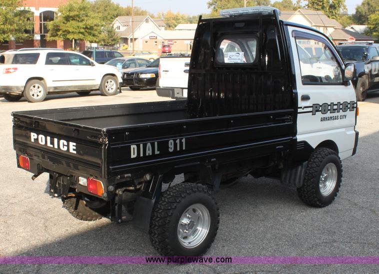 image for item H8793 1991 Mitsubishi Kei pickup truck