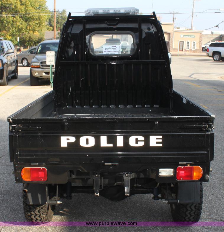 image for item H8793 1991 Mitsubishi Kei pickup truck