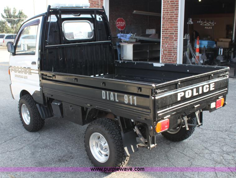 image for item H8793 1991 Mitsubishi Kei pickup truck