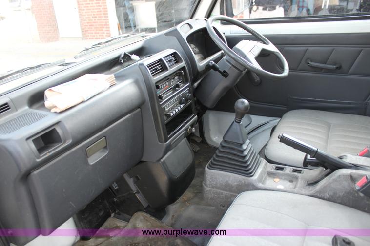 image for item H8793 1991 Mitsubishi Kei pickup truck