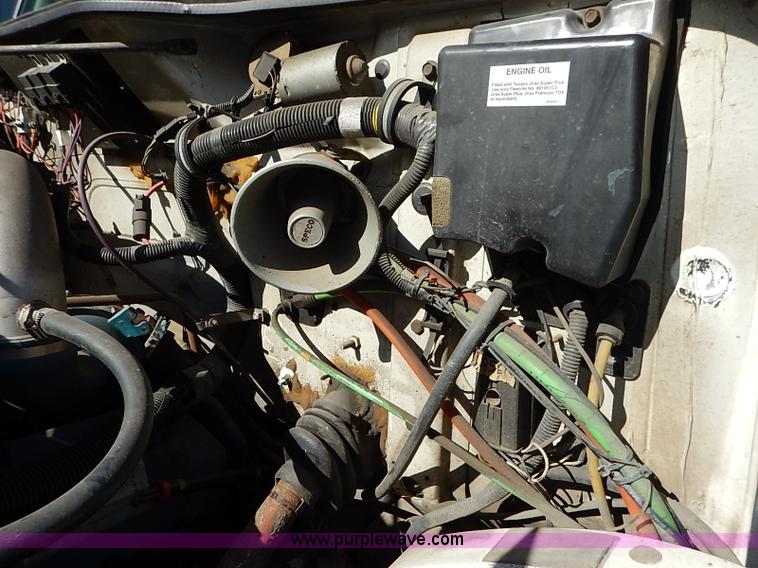 image for item I5310 2000 International 4700 scissor lift truck