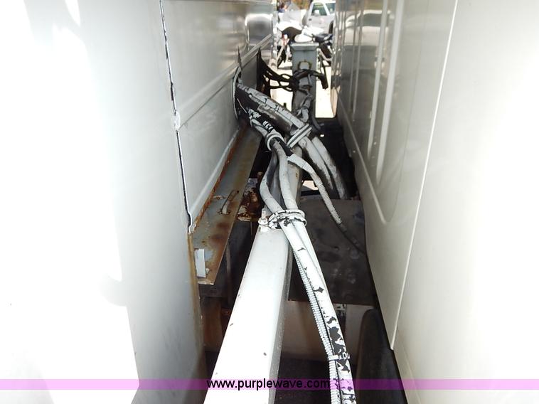 image for item I5310 2000 International 4700 scissor lift truck