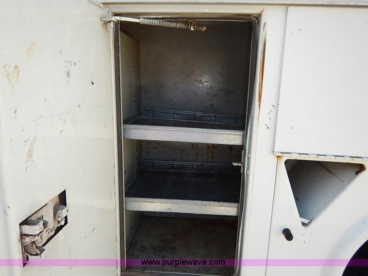 image for item I5310 2000 International 4700 scissor lift truck