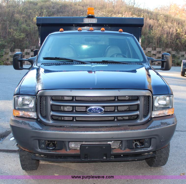 image for item I5916 2002 Ford F550 flatbed dump truck