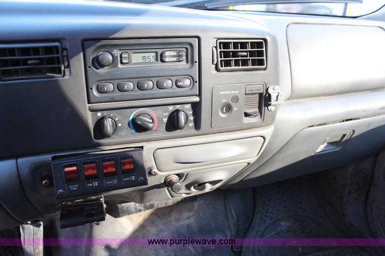 image for item I5916 2002 Ford F550 flatbed dump truck