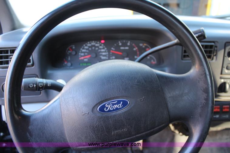 image for item I5916 2002 Ford F550 flatbed dump truck