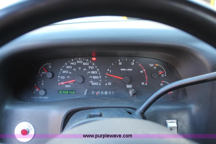 image for item I5916 2002 Ford F550 flatbed dump truck