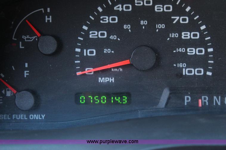 image for item I5916 2002 Ford F550 flatbed dump truck