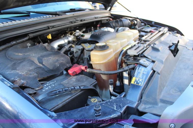 image for item I5916 2002 Ford F550 flatbed dump truck