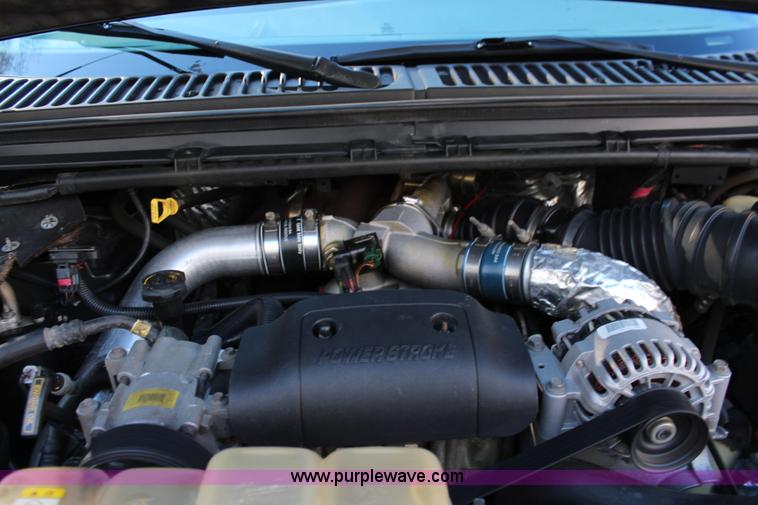 image for item I5916 2002 Ford F550 flatbed dump truck