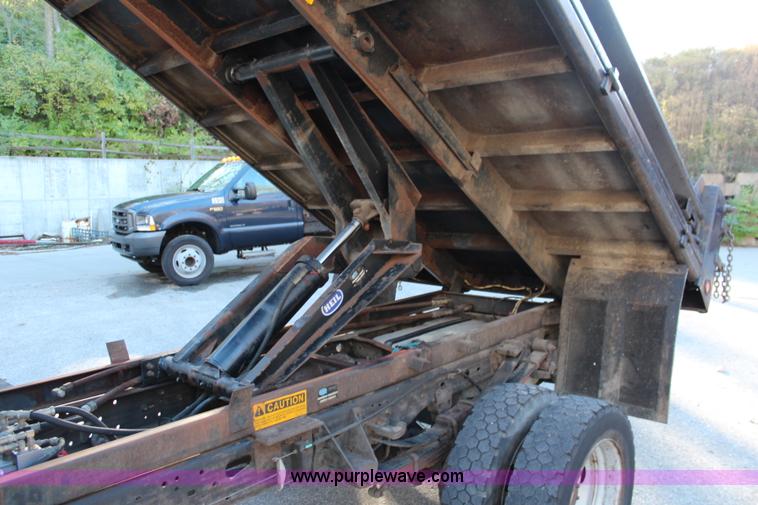 image for item I5916 2002 Ford F550 flatbed dump truck