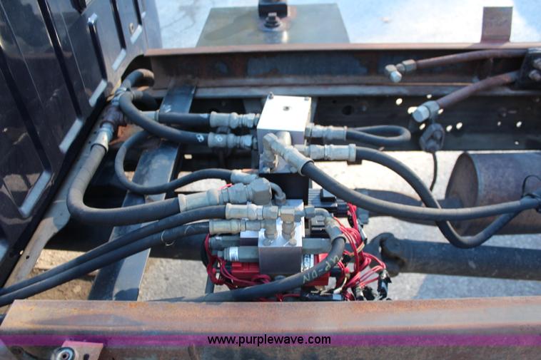 image for item I5916 2002 Ford F550 flatbed dump truck