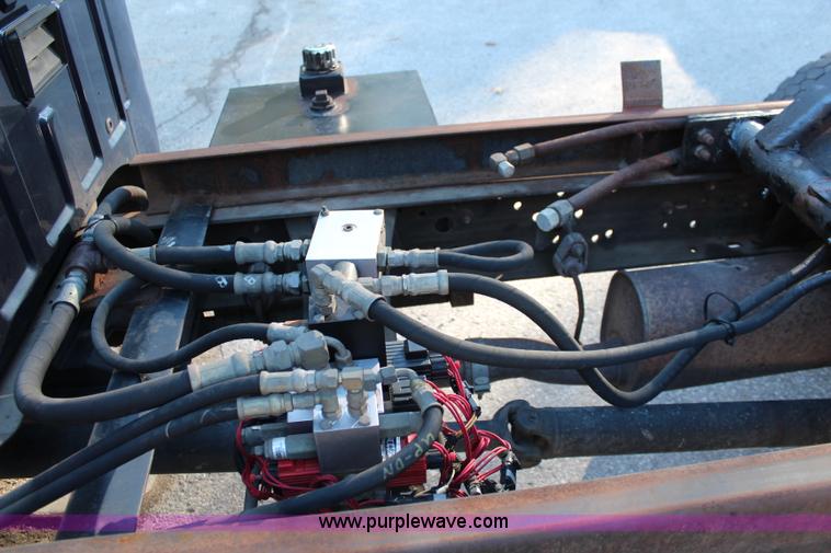 image for item I5916 2002 Ford F550 flatbed dump truck