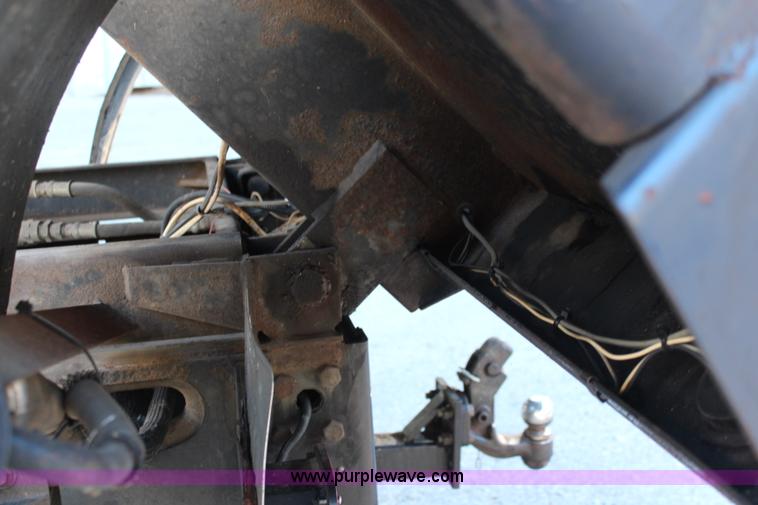 image for item I5916 2002 Ford F550 flatbed dump truck