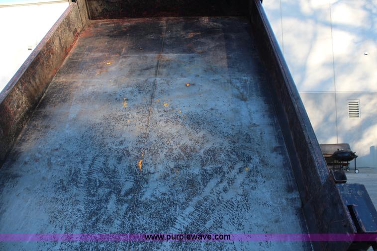 image for item I5916 2002 Ford F550 flatbed dump truck