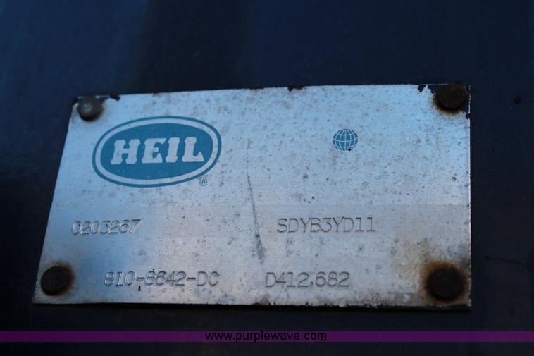 image for item I5916 2002 Ford F550 flatbed dump truck