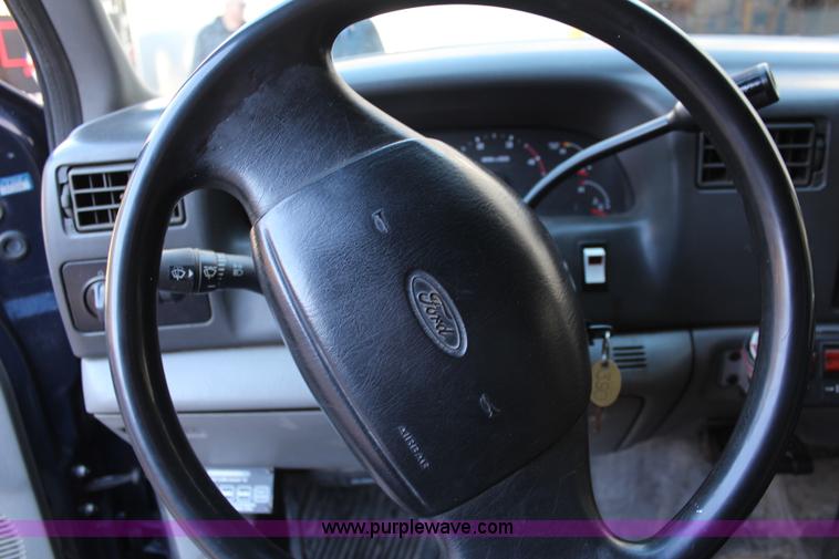 image for item I5917 2002 Ford F550 flatbed dump truck