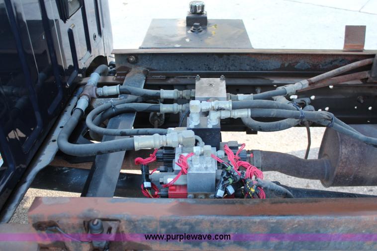 image for item I5917 2002 Ford F550 flatbed dump truck