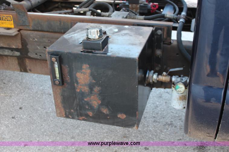 image for item I5917 2002 Ford F550 flatbed dump truck