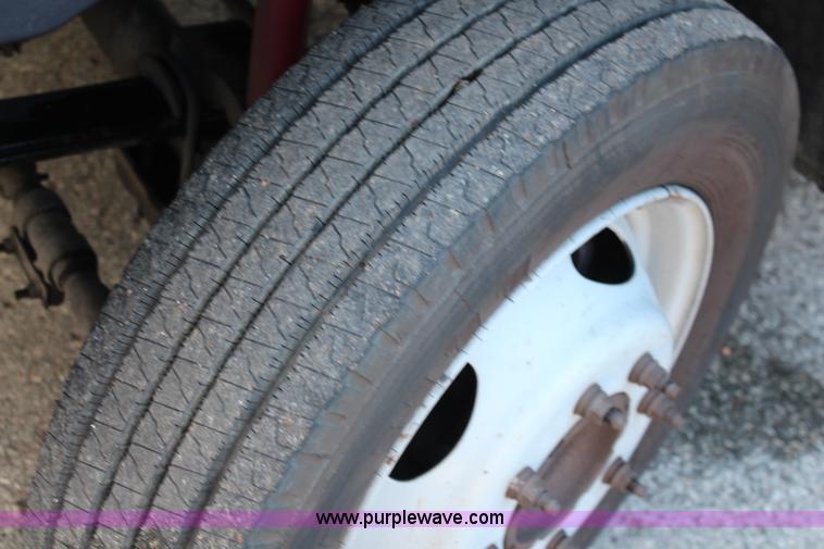 image for item I5917 2002 Ford F550 flatbed dump truck