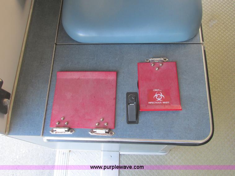 image for item J2383 2001 Ford 801 ambulance