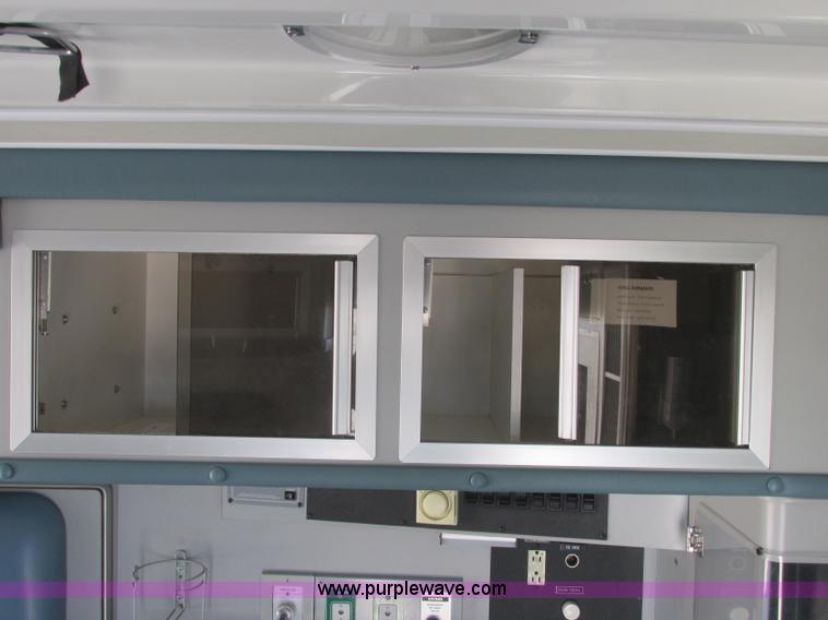 image for item J2383 2001 Ford 801 ambulance