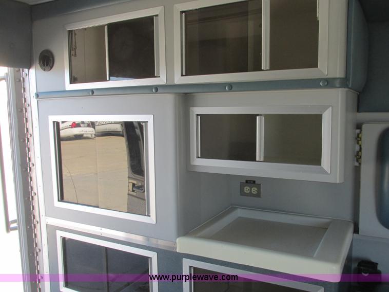 image for item J2383 2001 Ford 801 ambulance