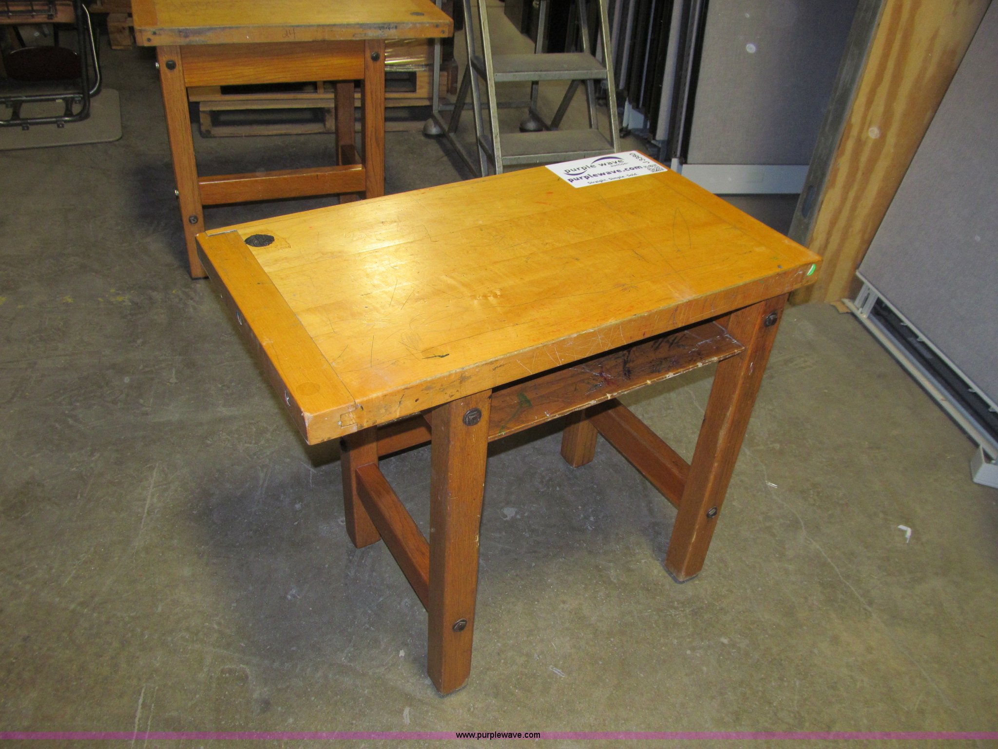 Wood table in Des Moines, IA Item J3380 sold Purple Wave