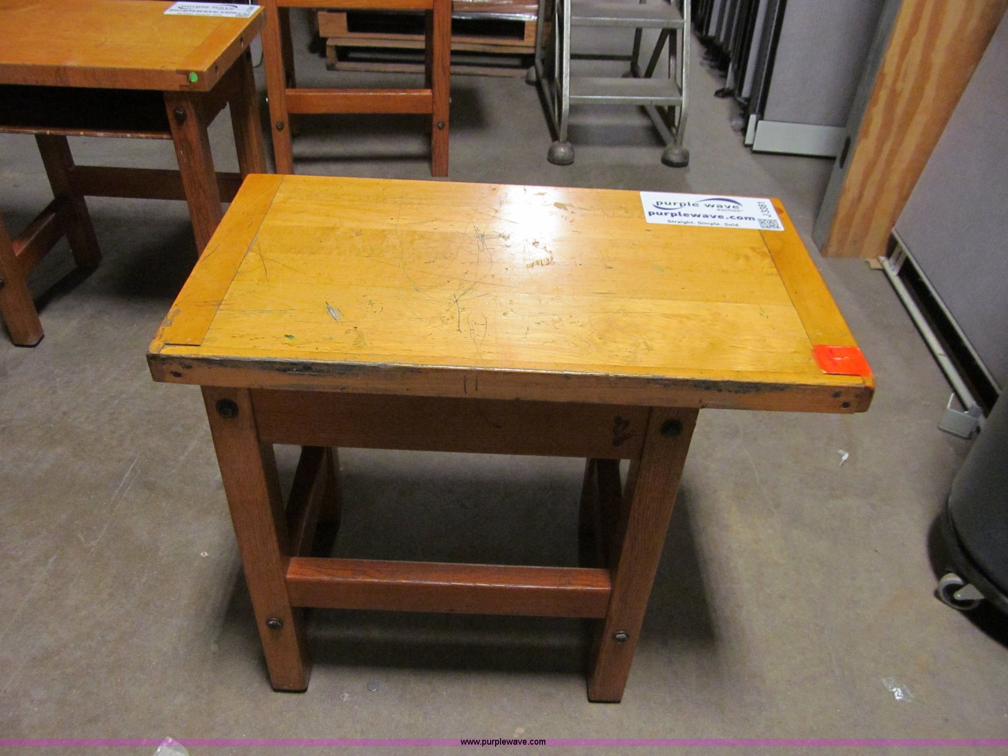 Wood table in Des Moines, IA Item J3381 sold Purple Wave