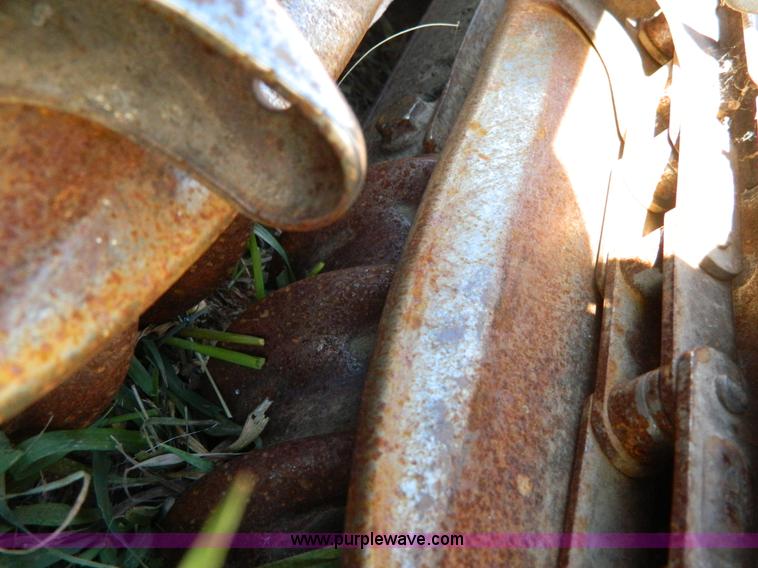 image for item H2348 1990 Case 1083 corn head