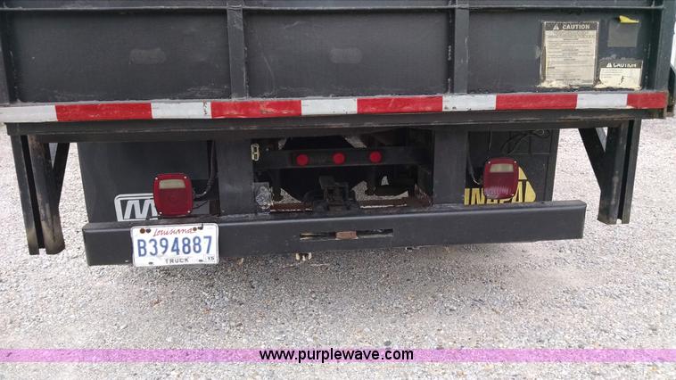 image for item AW9135 2000 International 4700 flatbed truck